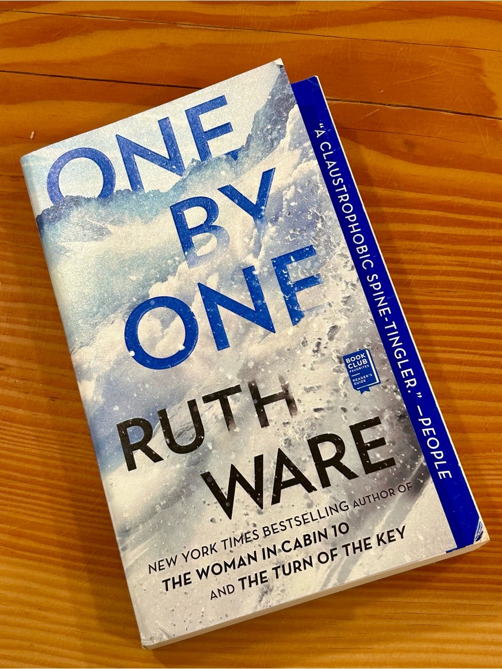 One By One Ruth Ware paperback book